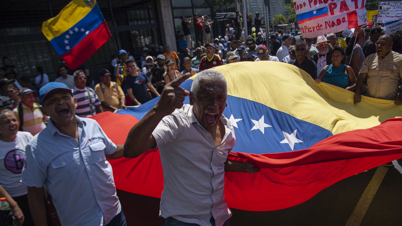 Caracas protesters demanding higher wages amid Venezuela economic crisis and US sanctions easing