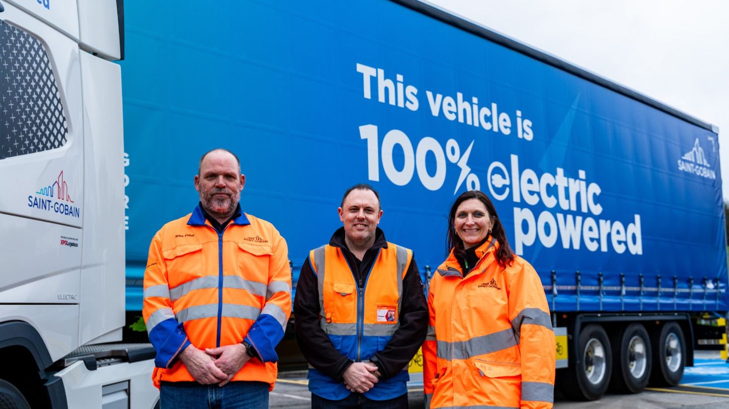 Volvo electric HGVs charging at Saint-Gobain Gotham logistics hub in Nottinghamshire