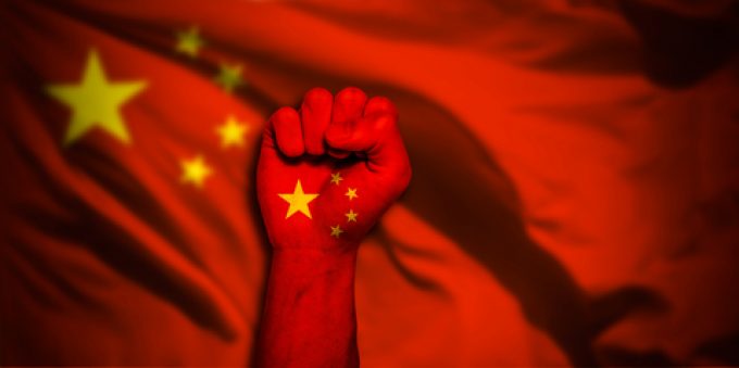 Maersk container ship at Panama Canal port with Chinese flag overlay