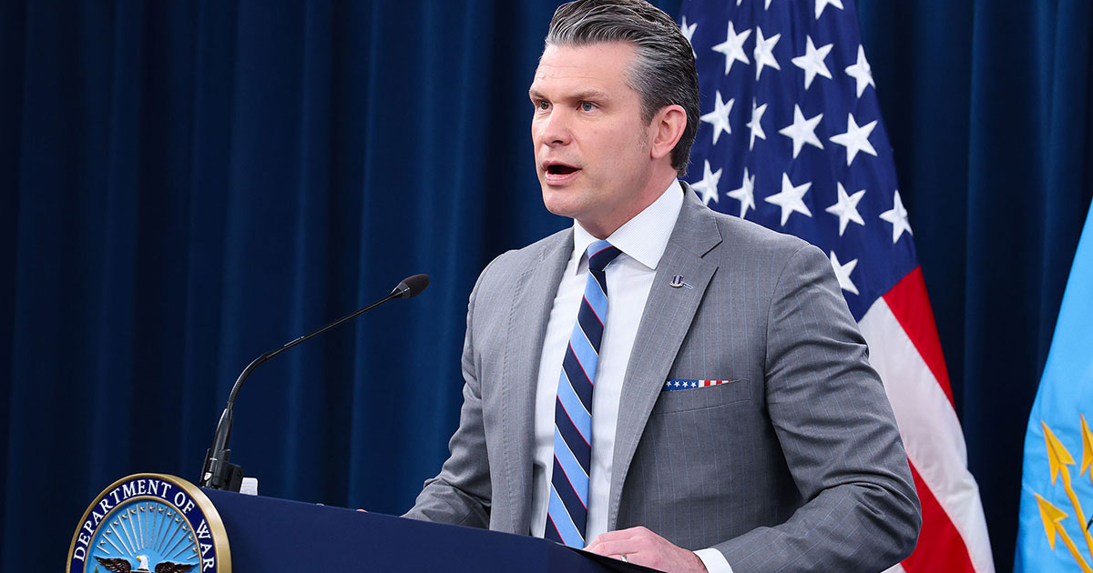 A container ship sailing on the ocean, symbolizing global trade routes.