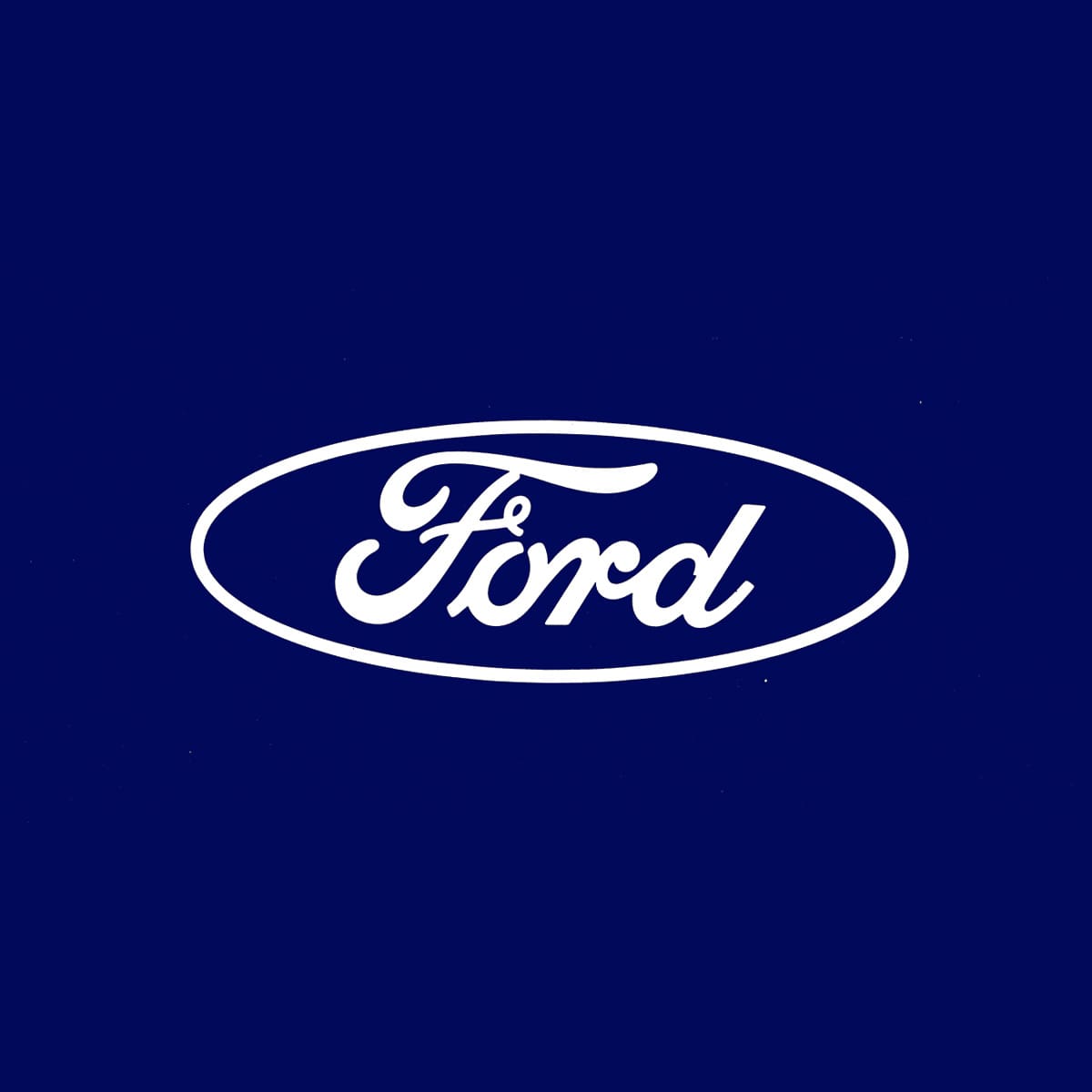 A Ford electric vehicle production line showing complex machinery and robotic arms.