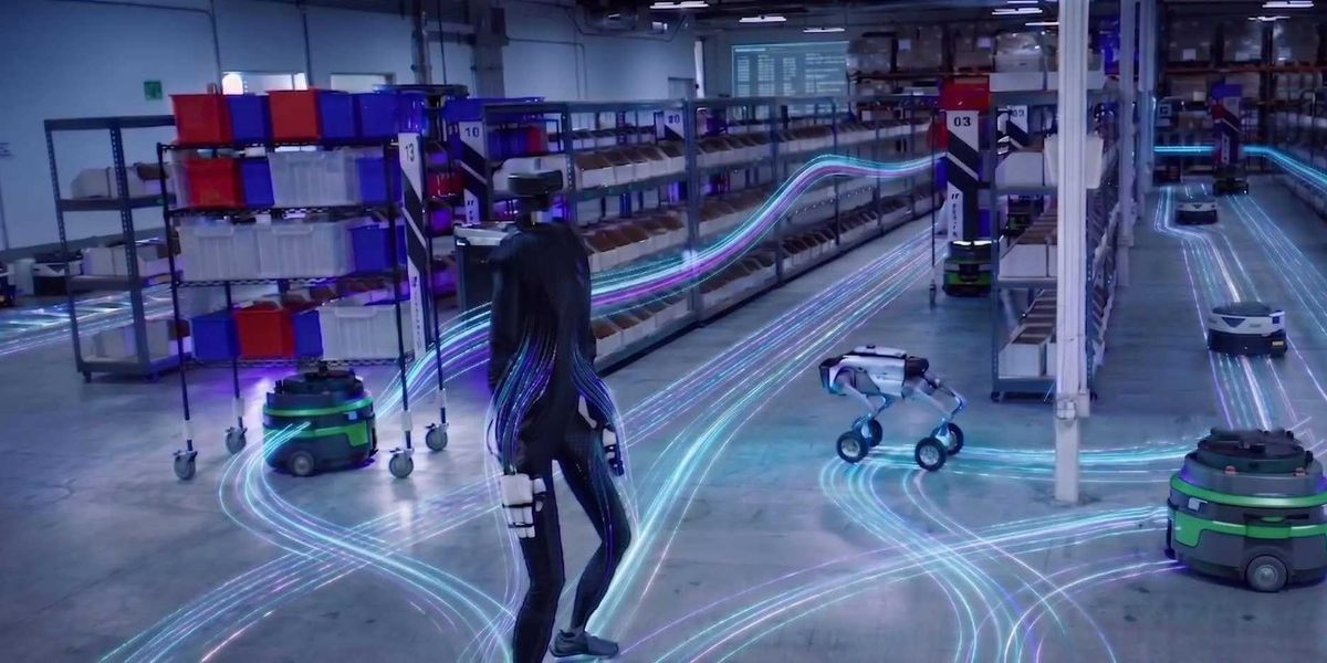 An illustration of a warehouse with various robots and human workers interacting, representing a unified automation solution.