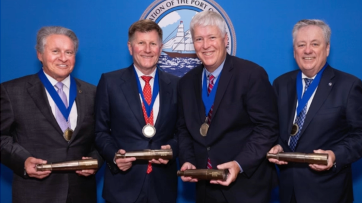 James W. McNamara receiving an award.