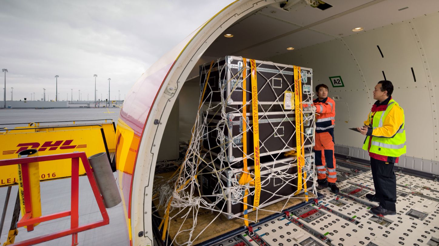 Illustration of a large cargo plane in flight with the DHL Express logo.
