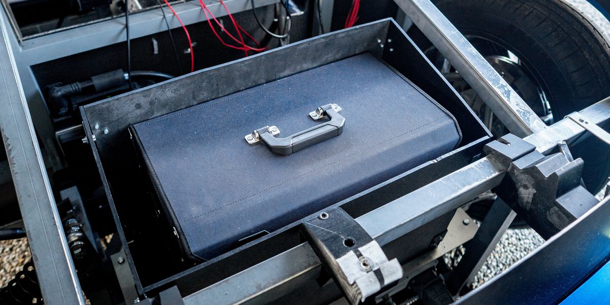 Eindhoven students unveiling Aria EV prototype with exposed modular battery modules