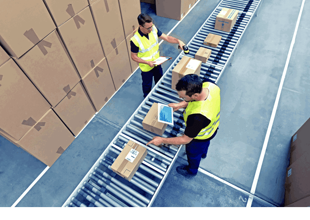 A warehouse supervisor looking at a tablet displaying a complex, interconnected dashboard with real-time data flow.
