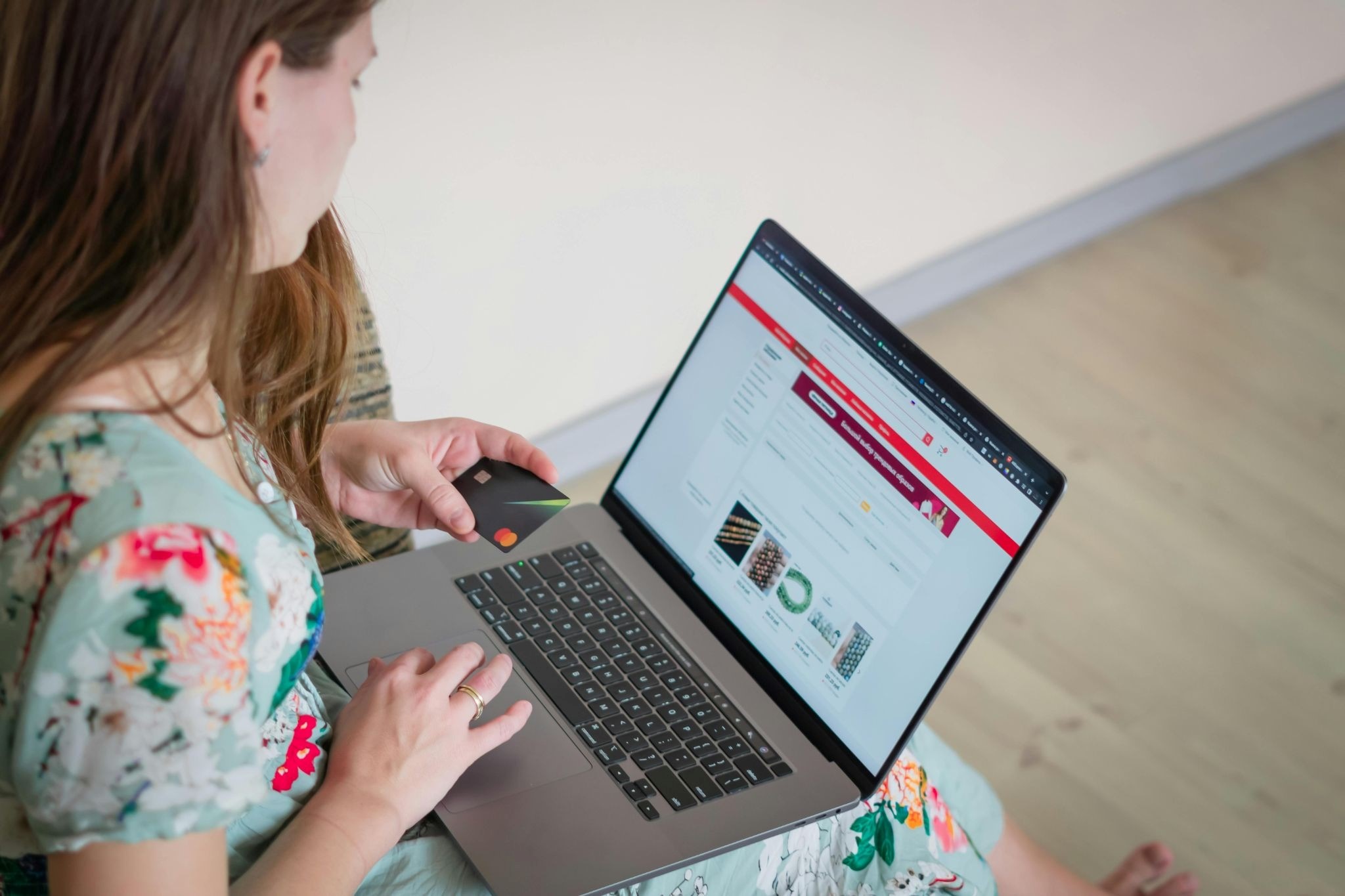 A split image showing a glowing e-commerce app interface on one side and a busy, automated warehouse on the other, connected by a digital line.
