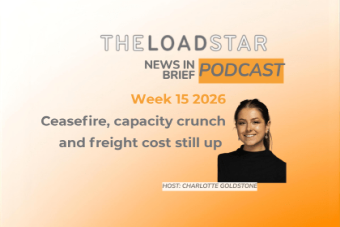 A cargo plane flying over a stormy sea, symbolizing volatile air freight markets.