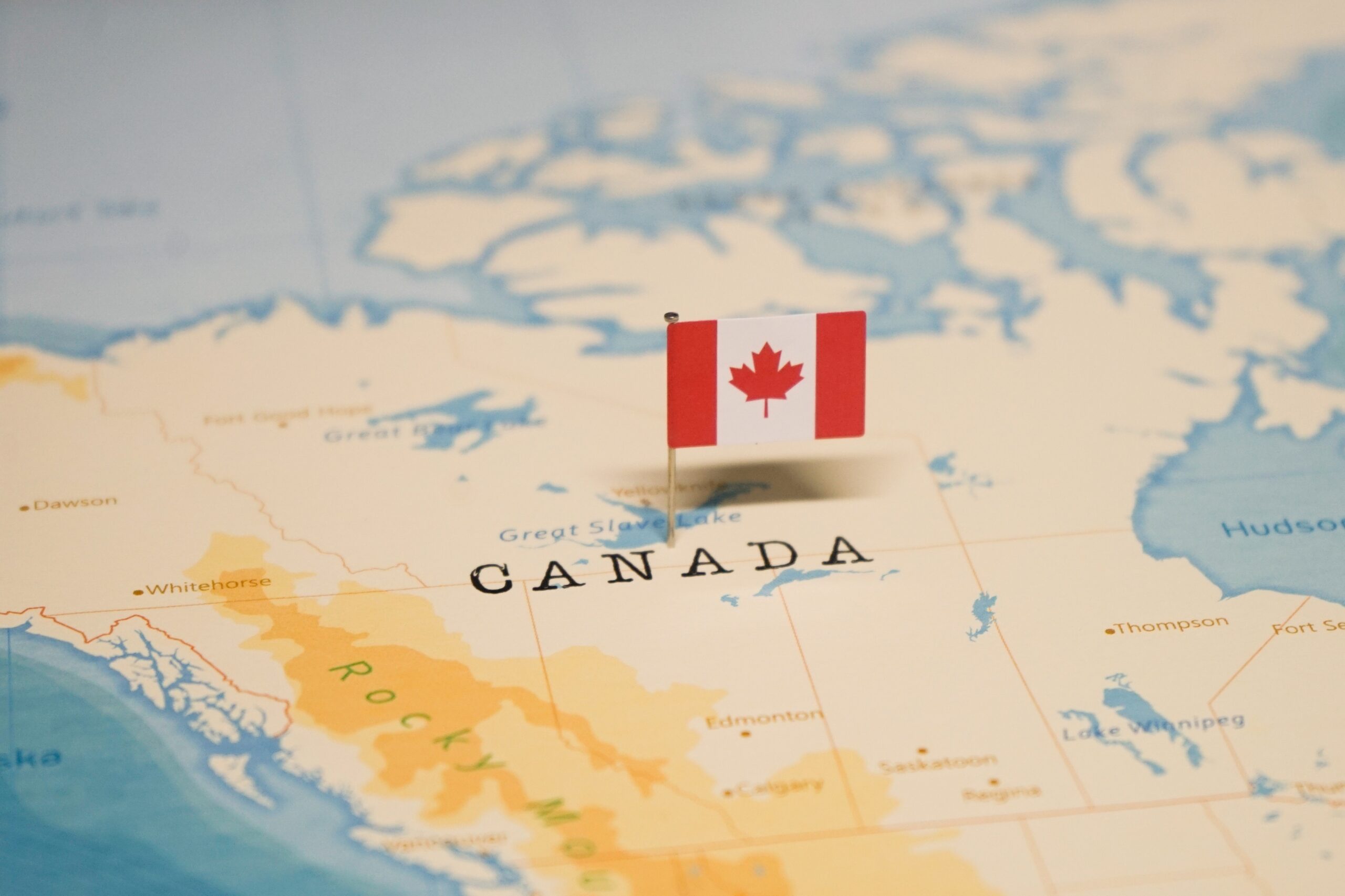 Abstract representation of data streams flowing into a Canadian flag silhouette, symbolizing AI assisting with customs compliance.